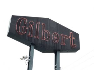 The Gilbert Synchonicity: Sign on the way to the dry cleaners